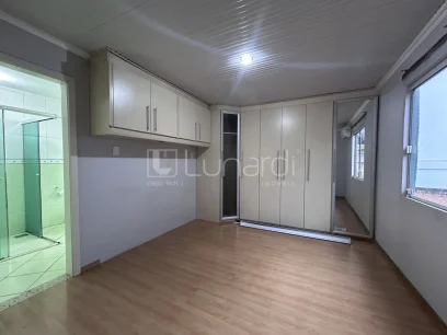 Foto Casa com 4 Dormitórios