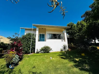 Foto Casa com 4 Dormitórios