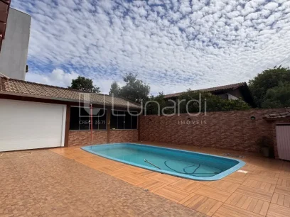 Foto Casa com 6 Dormitórios