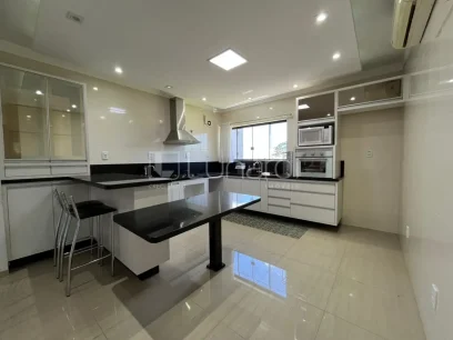 Foto Casa com 3 Dormitórios