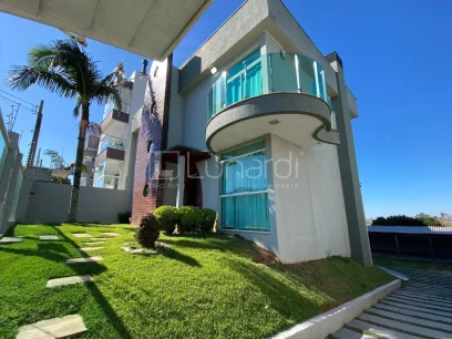 Foto Casa com 3 Dormitórios