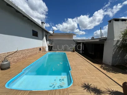 Foto Casa com 3 Dormitórios