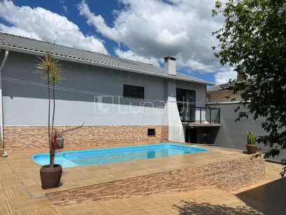 Foto Casa com 3 Dormitórios