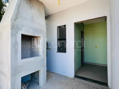 Foto Casa com 3 Dormitórios