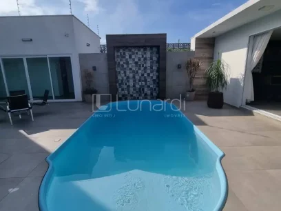 Foto Casa com 3 Dormitórios