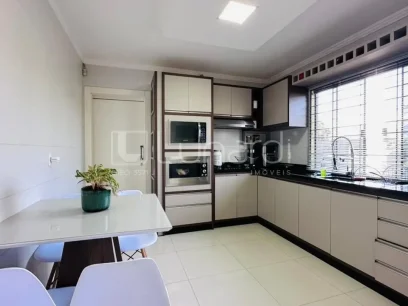 Foto Casa com 3 Dormitórios