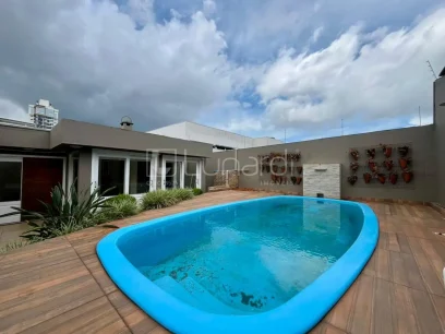 Foto Casa com 3 Dormitórios