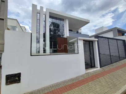 Foto Casa com 3 Dormitórios