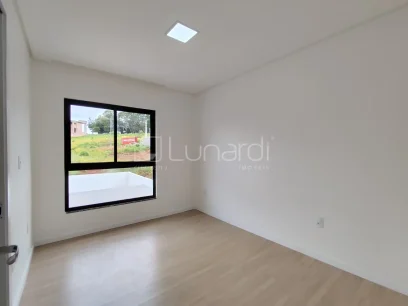 Foto Casa com 3 Dormitórios