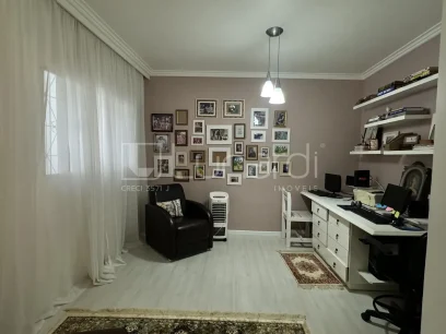 Foto Casa com 4 Dormitórios