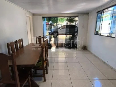 Foto Casa com 3 Dormitórios