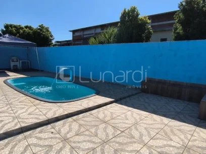 Foto Casa com 3 Dormitórios