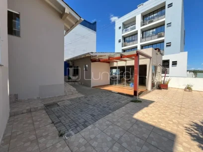 Foto Casa com 3 Dormitórios