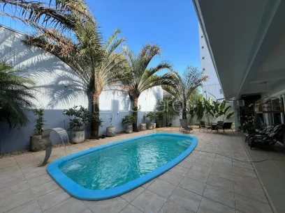 Foto Casa com 3 Dormitórios