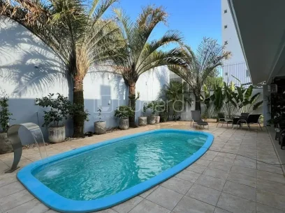 Foto Casa com 3 Dormitórios