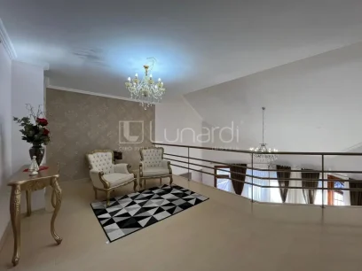 Foto Casa com 4 Dormitórios