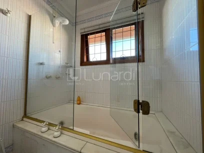 Foto Casa com 4 Dormitórios