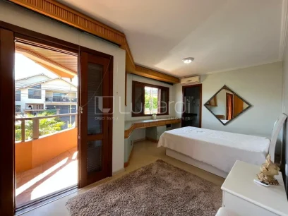 Foto Casa com 4 Dormitórios