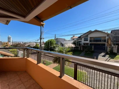 Foto Casa com 4 Dormitórios