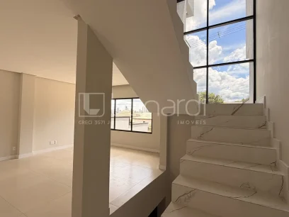 Foto Sobrado com 3 Dormitórios