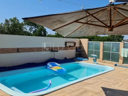 Foto Casa com 3 Dormitórios