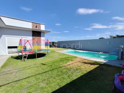 Foto Casa com 3 Dormitórios