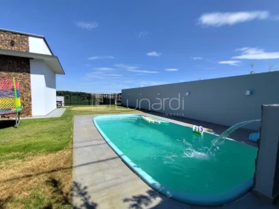 Foto Casa com 3 Dormitórios