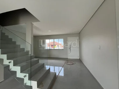 Foto Sobrado com 3 Dormitórios