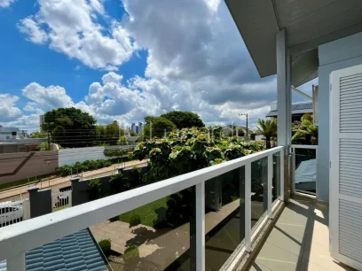 Foto Casa com 4 Dormitórios