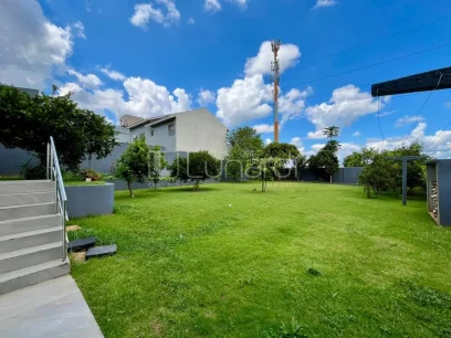 Foto Casa com 4 Dormitórios