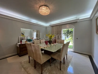 Foto Casa com 4 Dormitórios