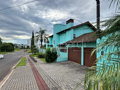 Foto Casa com 4 Dormitórios