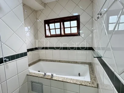 Foto Casa com 4 Dormitórios