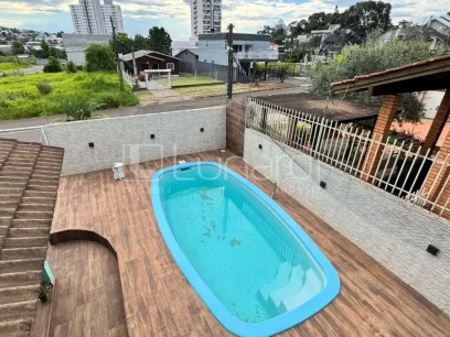 Foto Casa com 4 Dormitórios