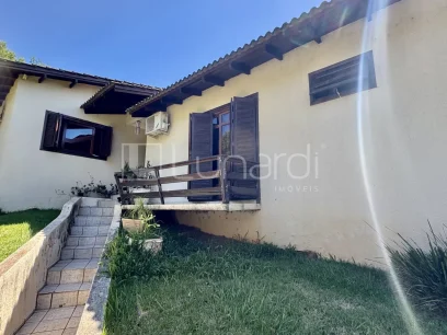 Casa com 4 Dormitórios - Miniatura - Lunardi Imóveis