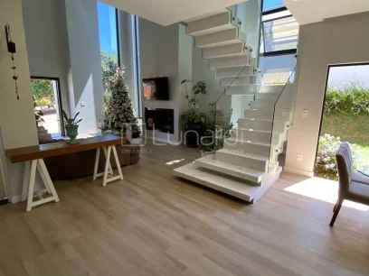 Casa com 4 Dormitórios - Miniatura - Lunardi Imóveis