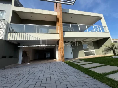 Casa com 4 Dormitórios - Lunardi Imóveis