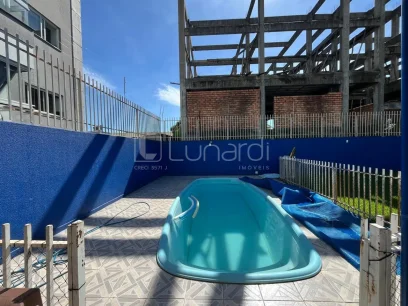 Casa com 4 Dormitórios - Miniatura - Lunardi Imóveis