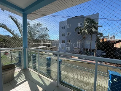 Casa com 4 Dormitórios - Miniatura - Lunardi Imóveis