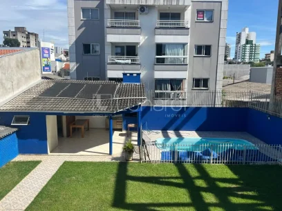 Casa com 4 Dormitórios - Miniatura - Lunardi Imóveis