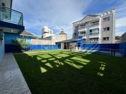 Casa com 4 Dormitórios - Miniatura - Lunardi Imóveis