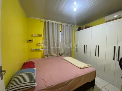 Casa com 3 Dormitórios - Miniatura - Lunardi Imóveis
