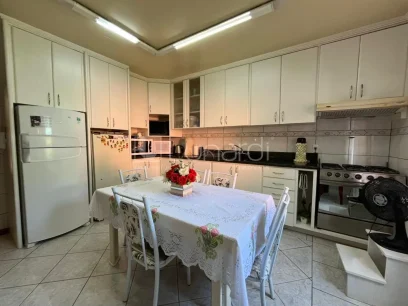 Casa com 4 Dormitórios - Miniatura - Lunardi Imóveis