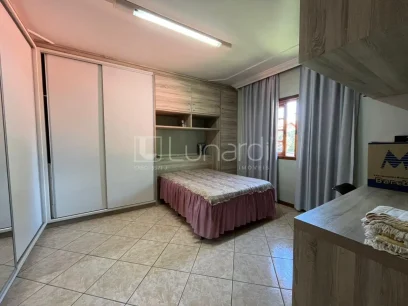 Casa com 4 Dormitórios - Miniatura - Lunardi Imóveis