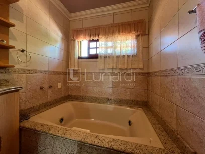 Casa com 4 Dormitórios - Miniatura - Lunardi Imóveis