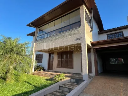 Casa com 4 Dormitórios - Lunardi Imóveis