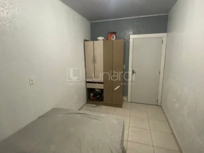 Casa com 4 Dormitórios - Miniatura - Lunardi Imóveis