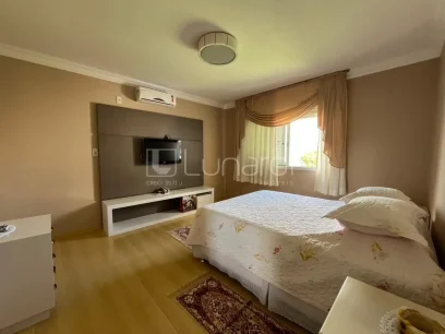 Casa com 4 Dormitórios - Miniatura - Lunardi Imóveis