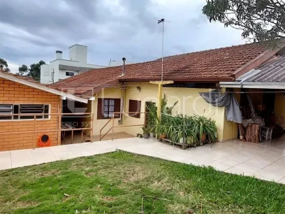 Casa com 4 Dormitórios - Lunardi Imóveis