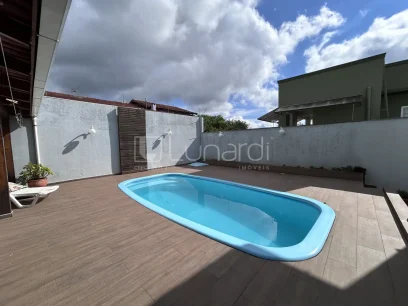 Casa com 4 Dormitórios - Miniatura - Lunardi Imóveis